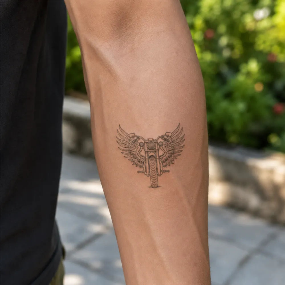 SafeTatt — Winged Motorcycle · fotografie tetování na kůži